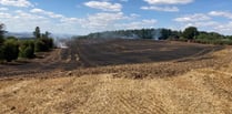 Crews tackle 15-acre field fire near Ruardean