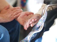 Calls for carers to be paid at least £2 an hour more