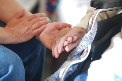 Calls for carers to be paid at least £2 an hour more