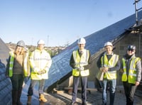 Harper checks out new Levelling Up-funded solar panels at the Wesley