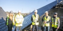 Harper checks out new Levelling Up-funded solar panels at the Wesley