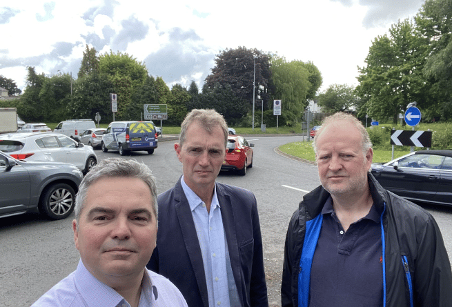 (L-R) St Kingsmark ward councillor Christopher Edwards, David Davies MP and resident Phil Tate at Highbeech roundabout in Chepstow.