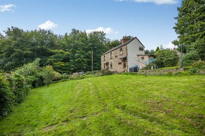Character cottage for sale sits directly opposite woodland 