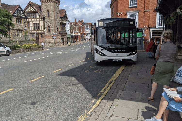 Passengers boarding the 232 bus at Cantilupe Road, Ross-on-Wye