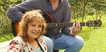 International duo in concert at folk club