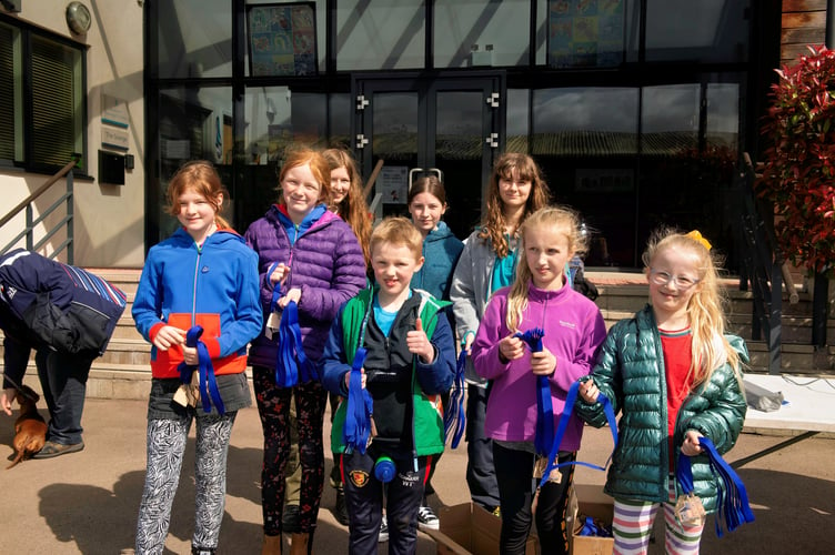 Youngsters were on hand to give out medals at the finish line