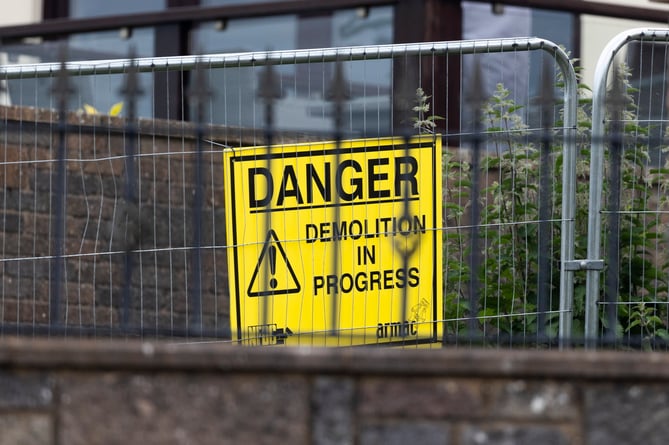 Demolition work has begun on Britain's biggest man cave, 10 years on from when it was constructed without planning permission by Graham Wildin. Cinderford, Gloucestershire. June 04 2024.  The UK's âbiggest man caveâ is finally being torn down after a long running battle over the "eyesore" built more than ten years ago. Millionaire Graham Wildin, 70, has continuously defied court orders to knock down his illegal 10,000sq/ft leisure complex - and has even served jail time over it. The row has been ongoing since 2014 when he built the man cave with a bowling alley, casino and a cinema at the back of his home - without planning permission. Wildin, of Cinderford, Glos, was even locked up for failing to comply with a court order to decommission the building and has lost a string of other court cases.
