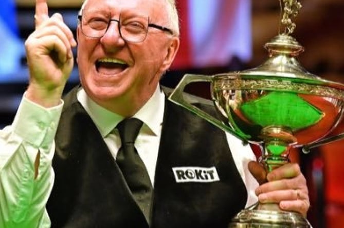 Dennis Taylor recreating  the moment of his glorious victory