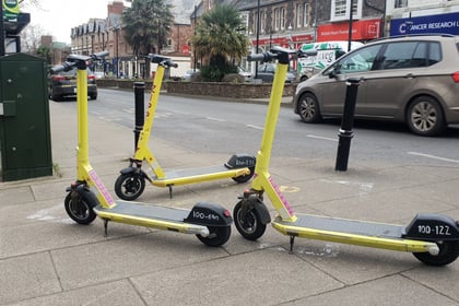 Police hunt e-scooter rider after woman hurt in collision