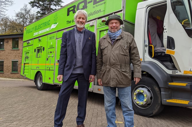 Councillor Chris McFarling, Cllr Chris McFarling Cabinet Member for Climate Emergency (left) and Deputy Leader Andy Moore with one of the electric recycling vehicles