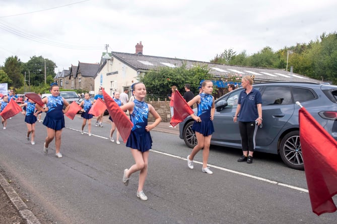 The Harmony Twirlstars Marching Band.