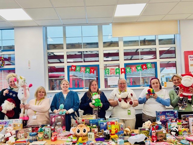 Staff and volunteers with some of the toys at the Gloucestershire retail event