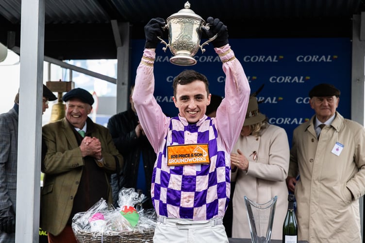 Charlie Hammond lifts the trophy